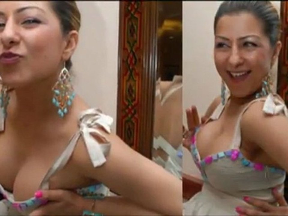 Busty singer pressing her.....