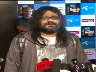 Pritam Wins Award At Uninor Radio Mirchi Awards 2011