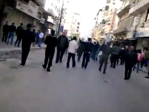 Oblige Syrians people by military police and bandits to demonstration for Assad 01