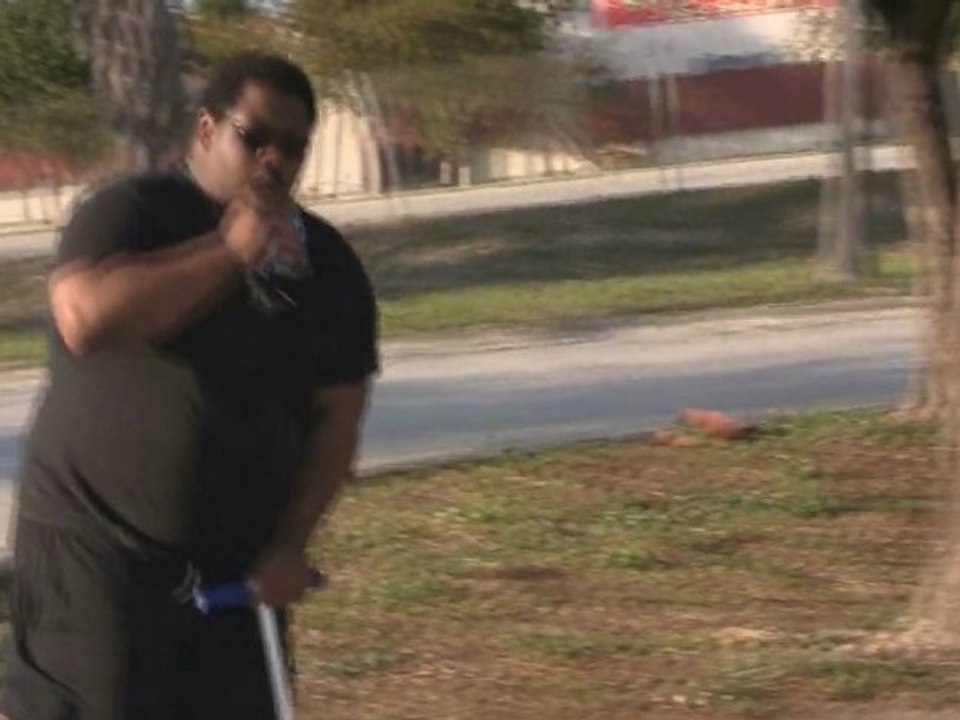 BIG ASS NIGGA ON A SCOOTER DRINKIN CAPRI SUN