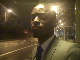 Mr Ade Peter White waits for the 72 bus