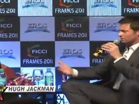 Shahrukh Kahn,Karan Johar Speaks With Hugh Jackman At FICCI Frames 2011