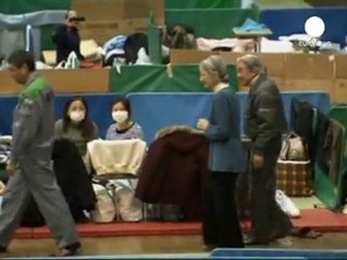 Japanese emperor visits tsunami evacuees