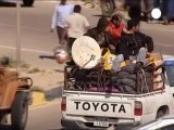 Civilians flee as Libyan rebels battle for Brega