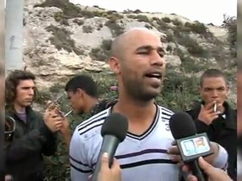 Tunisian migrants riot on Italian island