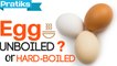 How to tell the difference between an unboiled and a hard-boiled egg ?