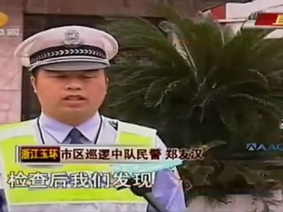 Man driving two bumper cars down the street in China