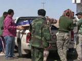 Libya rebels hold back under NATO air shield