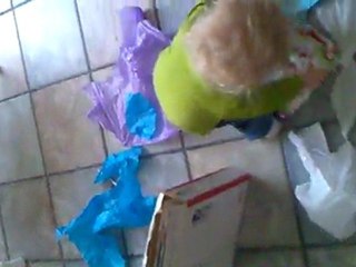 Mac opens her Easter presents from Grandma & Grandpa Moore