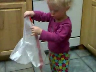 Mac helps take out the garbage.