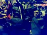 YouTube - 19 4 Homs Syrian security أوغاريت حمص الشبيحة والأامن السوري يحتفلون بقتل المتظاهرين العزل في ساحة الساعة الجدية بعد المجزرة