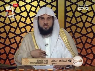 حكم الصلاة بلباس فيه صور؟