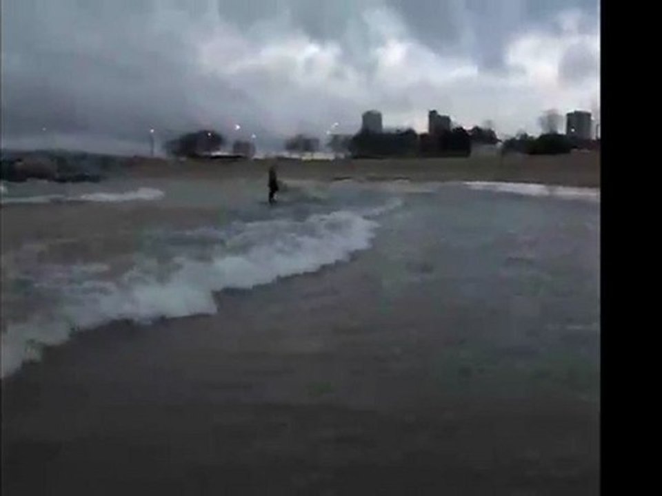 lake michigan storm day and hold out longboard surfing waves - april 2011