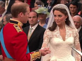 Kate and William kiss as the world watches