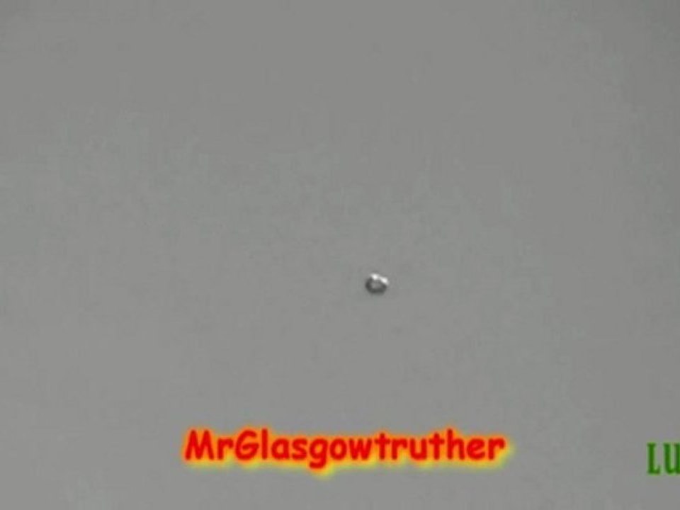 Donut shaped daytime UFO over Glasgow, UK 31-Aug-2010