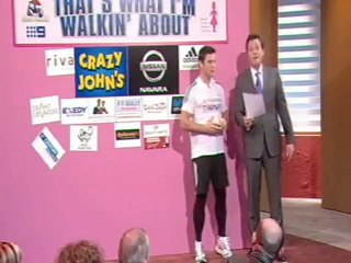 Jamie McIntyre donates to Shane Crawfords Breast Cancer walk