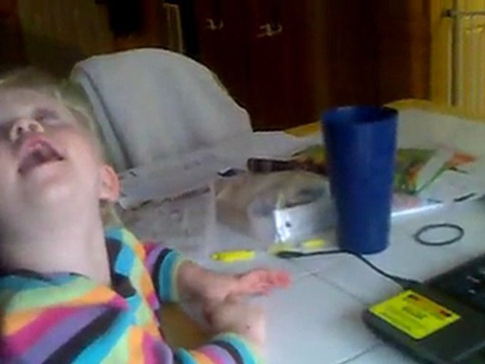 Mac watches her video