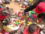 Sin clases, niños libios hacen trabajos voluntarios en Bengasi