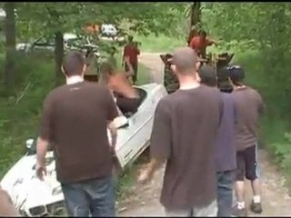 Tractor being used as redneck tow truck