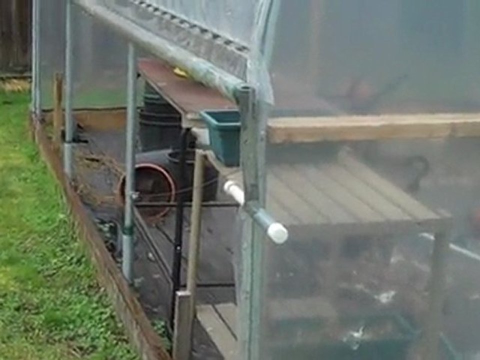 Poly Tunnel Greenhouse - Attaching Poly with Spring Lock