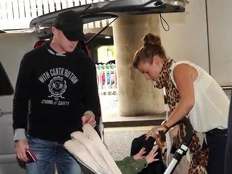 Wayne Rooney Covers Up New Hair