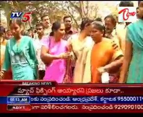 Vizag theatre owner, son held