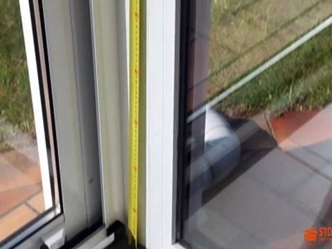 Store enrouleur pour véranda - Prise de mesure