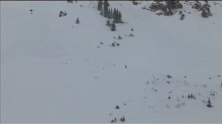 Snowboarder gets caught in double avalanche