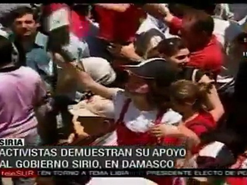 Activistas demuestran su apoyo el Gobierno sirio