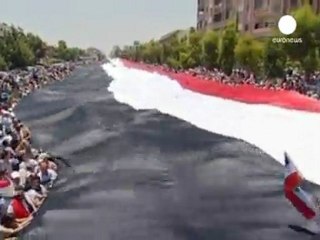 Massive pro and anti-govt rallies in Syria