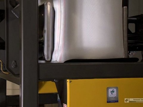 Bulk Bag Unloader with Bulk Bag Conditioning Deblocking Rams