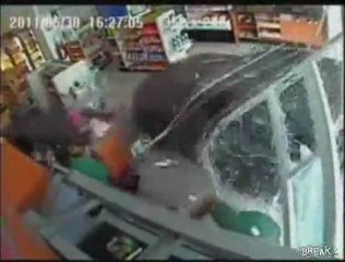 Lady drives through store while trying to park car