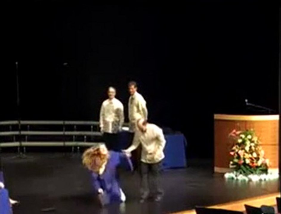 Girl Falls At Graduation Trying To Do The Running Man