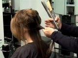 How To Use A Straightening Iron To Curl Hair
