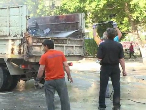 Athens clears up after Greece austerity riots
