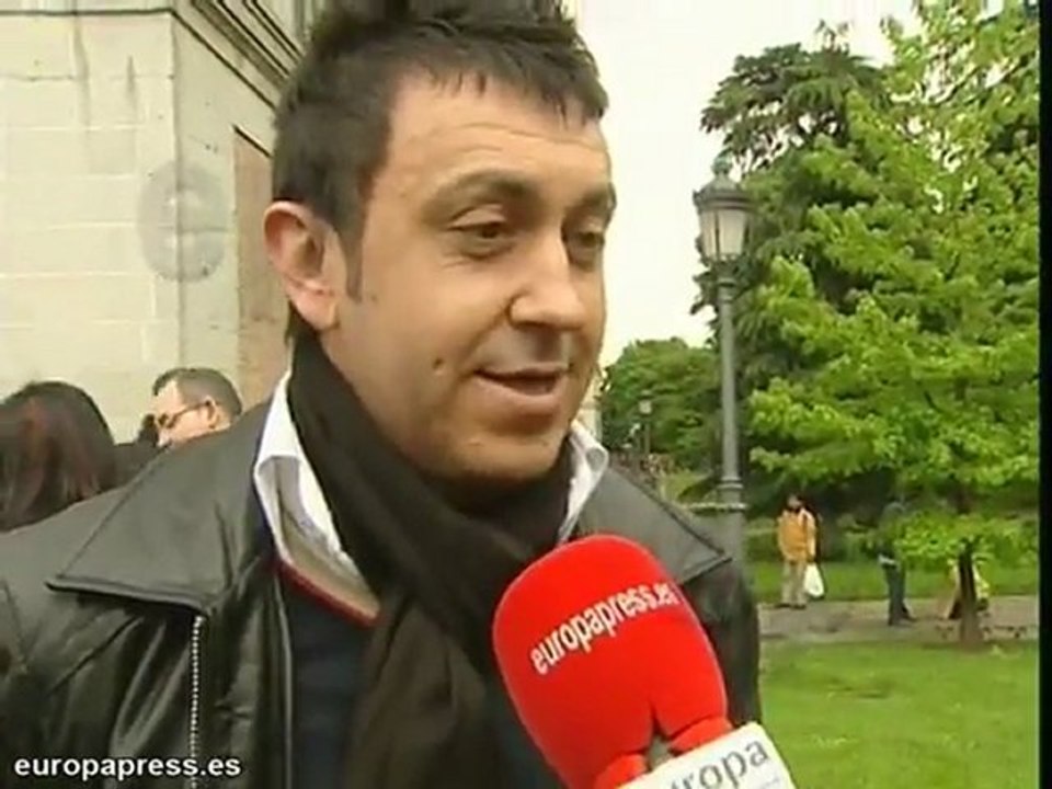 Turistas bajo la lluvia en Madrid