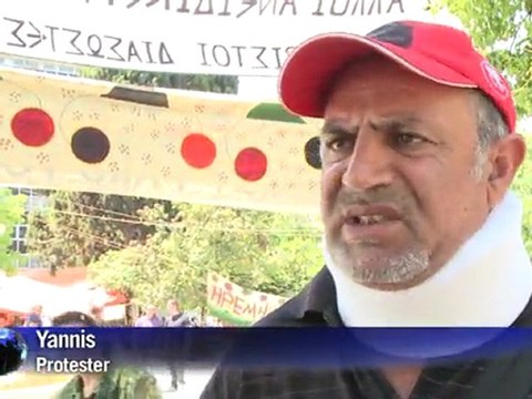 Arabic-Web-Greek premier hails tight austerity victory