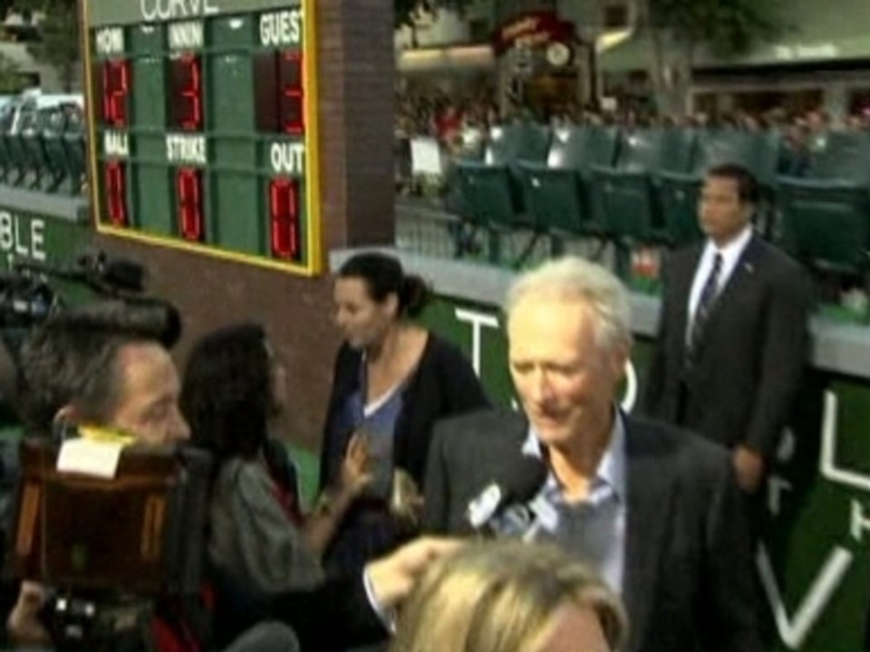 Eastwood and Adams work red carpet for "Trouble with Curve."