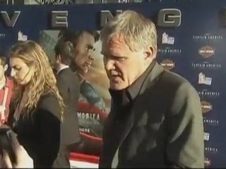 Chris Evans hits red, white and blue carpet for "Captain America"