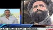 Taliban Blames U.S. for Phone Hacking, Denies Leader's Death