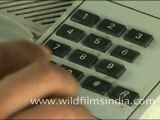 Push button telephone being used in India