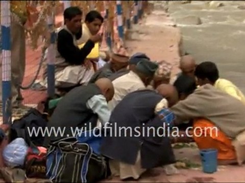Gangotri temple and tonsure on the river-bank…