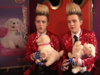 Jedward get to grips with puppies