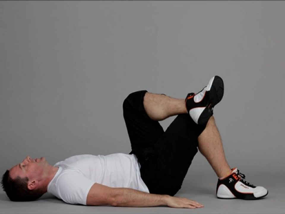 étirement fessier couché