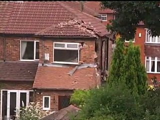 Plane crashes into houses in Manchester