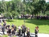 Norway buries first victims as police question gunman