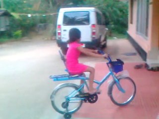 Sheetal Manandrai With Bicycle