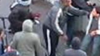 Video: Injured boy in riots mugged