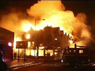 Flames rise in Croydon as London rioting spreads