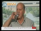 شبيح سوري يشرب في نهار رمضان على قناة العربية
